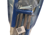 une photo montrant un tas d'outils dans un sac en plastique