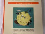 un livre sur lequel figure l'image d'une lune jaune