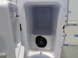 a white toilet with a blue seat and a black lid