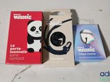 a panda bear phone case sitting next to a box of earphones