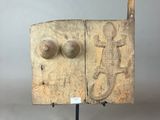 a close up of a piece of art on a stand