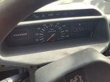 dashboard of a car with a steering wheel and a speedometer