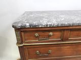 an image of a marble top chest of drawers on wheels