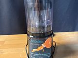 a blender that is sitting on a wooden table