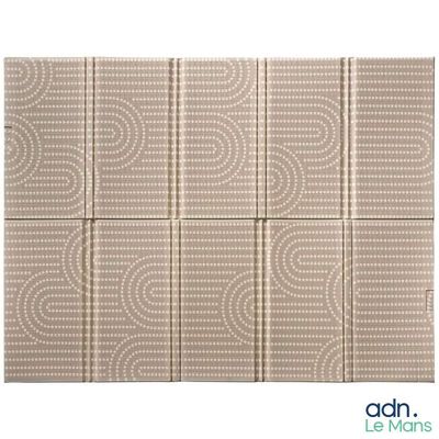 a close up of a tile with a pattern on it