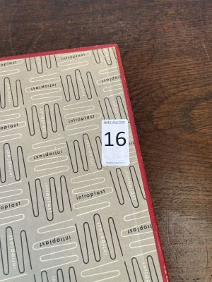 an image of a notebook on a table with a number on it