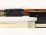 two different types of bows on a white surface