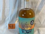 a bottle of rum that is sitting on a table