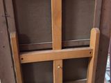 a picture of an easel that is on the floor
