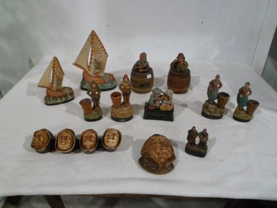 a lot of figurines that are on a table
