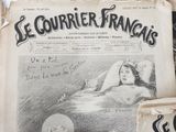 newspapers are stacked on top of each other with a drawing of a woman laying in a bed