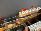 a wooden model of a boat on display in a room
