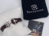 a black bag with a silver bracelet and a black bag with a picture of a horse