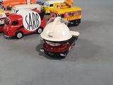 a lot of toy cars that are sitting on a table