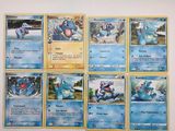beaucoup de cartes Pokémon accrochées au mur