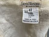a label on a white shirt that says gia versace