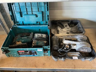 a tool box with tools in it on a table