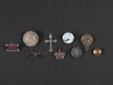 several different types of metal items are arranged on a black surface