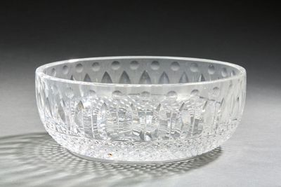 a glass bowl that is sitting on a table
