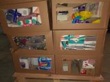 a cardboard box that has a bunch of items inside of it