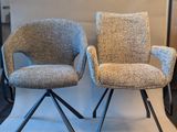 pair of mid - century style chairs with black metal legs and upholstered upholstered upholstered upholstered upholstered upholstered uphol