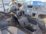 a dashboard of a truck with a steering wheel and dashboard controls