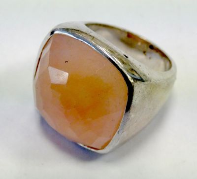 a close up of a ring with a stone in it