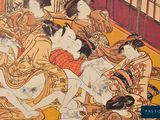 a picture of a group of women sitting on a floor