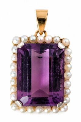 an amethorate and pearl pendant on a white background