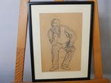 drawing of a man sitting on a chair next to a wooden easel