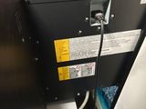 a machine that is sitting in the corner of a room