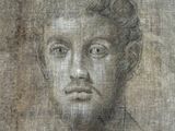 an old drawing of a man ' s face with a messy bunt on his head