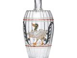 une image représentant un flacon de parfum en verre orné d'un oiseau