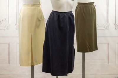 three mannequins that are on display in front of a white wall