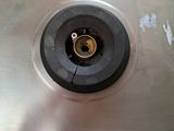 a metal sink with a metal faucet in it