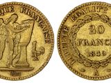 une pièce d'or avec l'image d'un homme tenant une épée