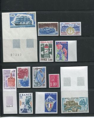 several different types of stamps are displayed on a black surface