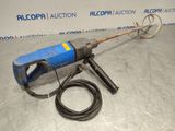 an electric drill with a cord attached to it sitting on a table