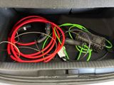 wires in the trunk of a car that is filled with wires