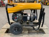 a close up of a small engine on a pallet in a warehouse