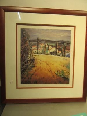 une image d'un tableau accroché au mur d'une pièce