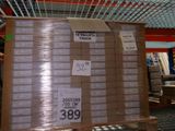 a pallet with a lot of boxes on it in a warehouse