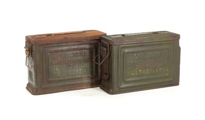pair of old tins with labels on them sitting on a white surface