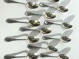 a lot of spoons that are on a table