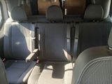 two seats in the back of a van that are empty