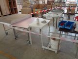 a table that has a bunch of boxes on it