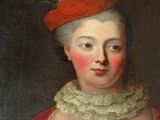 portrait of a lady in a red dress and a red hat