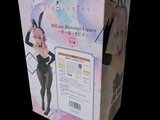 a cardboard box with a picture of a woman in a bunny suit