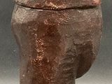 an image of a stone sculpture of a fire hydrant