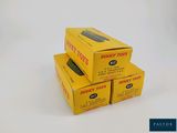 three boxes of pasta sitting on top of each other on a table
